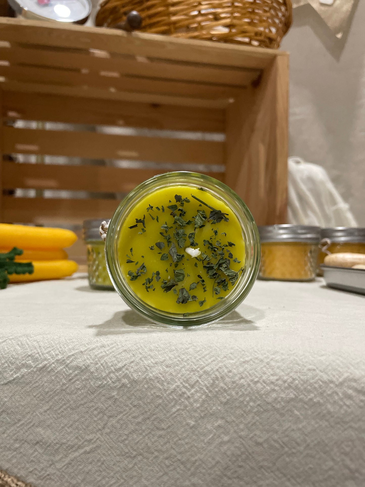 Hand-poured peppermint candle in a reusable jar with a refreshing, holiday-inspired scent, made with natural beeswax for a clean, eco-friendly burn