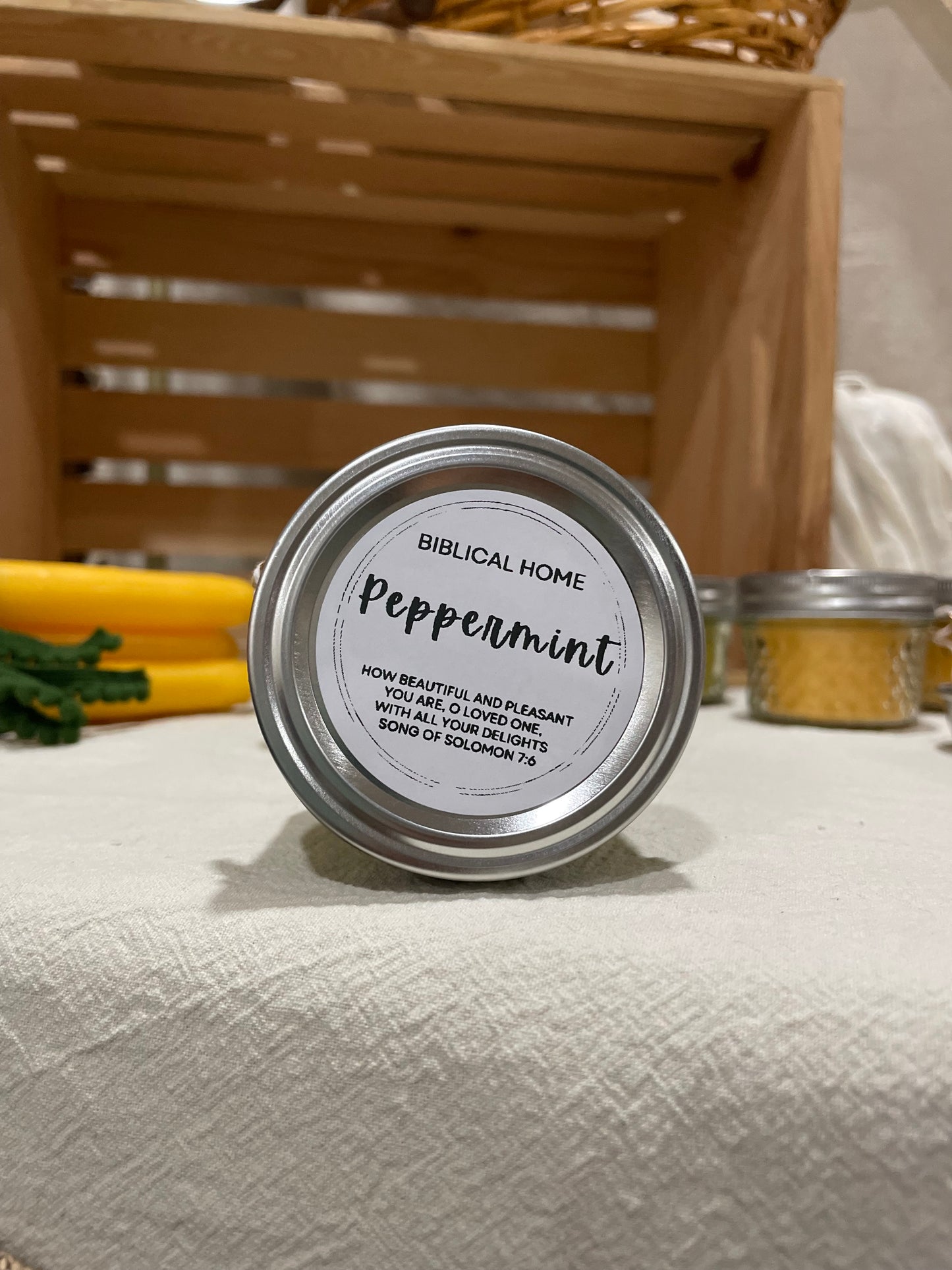 Hand-poured peppermint candle in a reusable jar with a refreshing, holiday-inspired scent, made with natural beeswax for a clean, eco-friendly burn