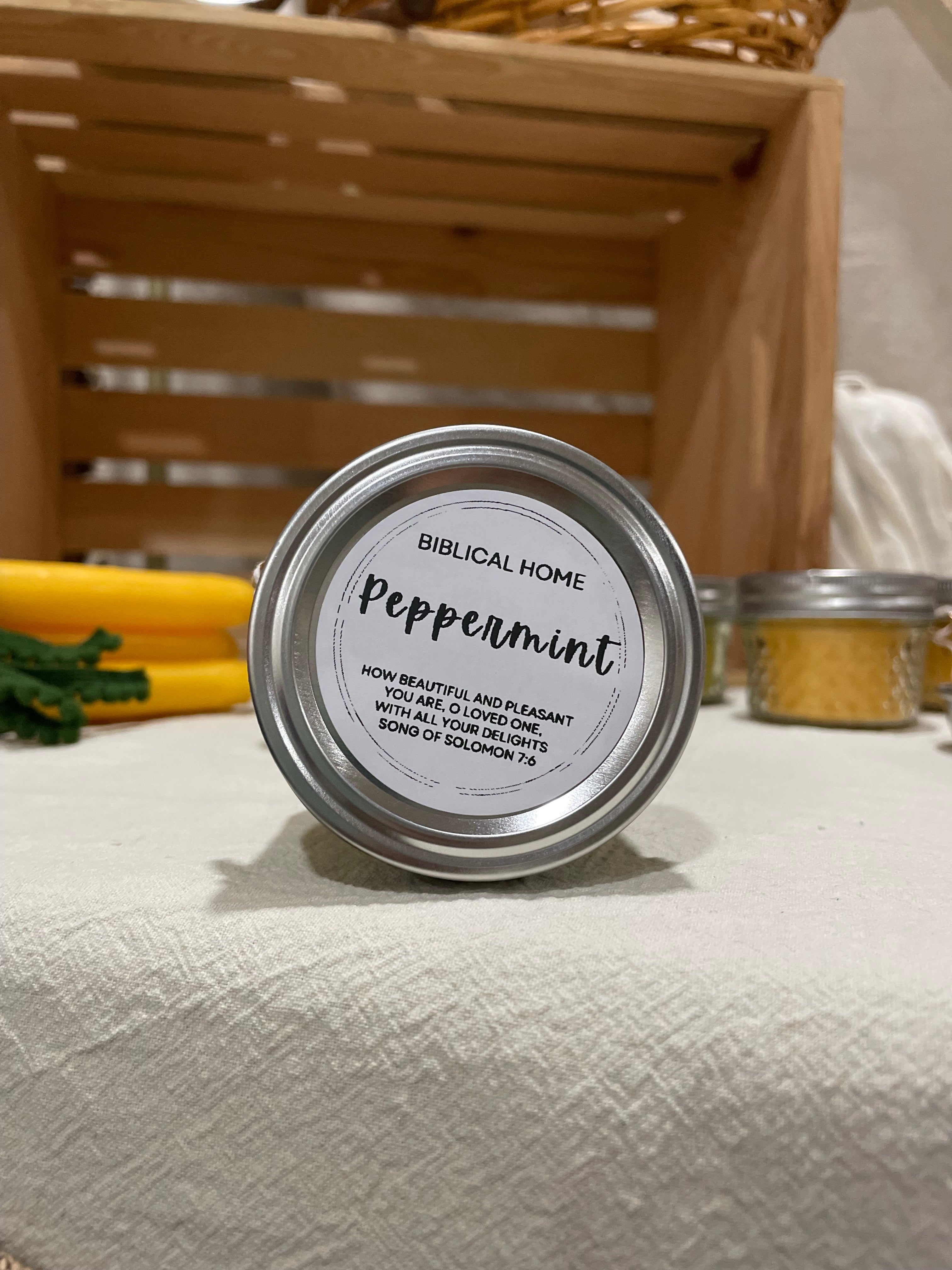 Hand-poured peppermint candle in a reusable jar with a refreshing, holiday-inspired scent, made with natural beeswax for a clean, eco-friendly burn